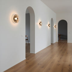Lámpara de pared LED de hierro con cristal ahumado